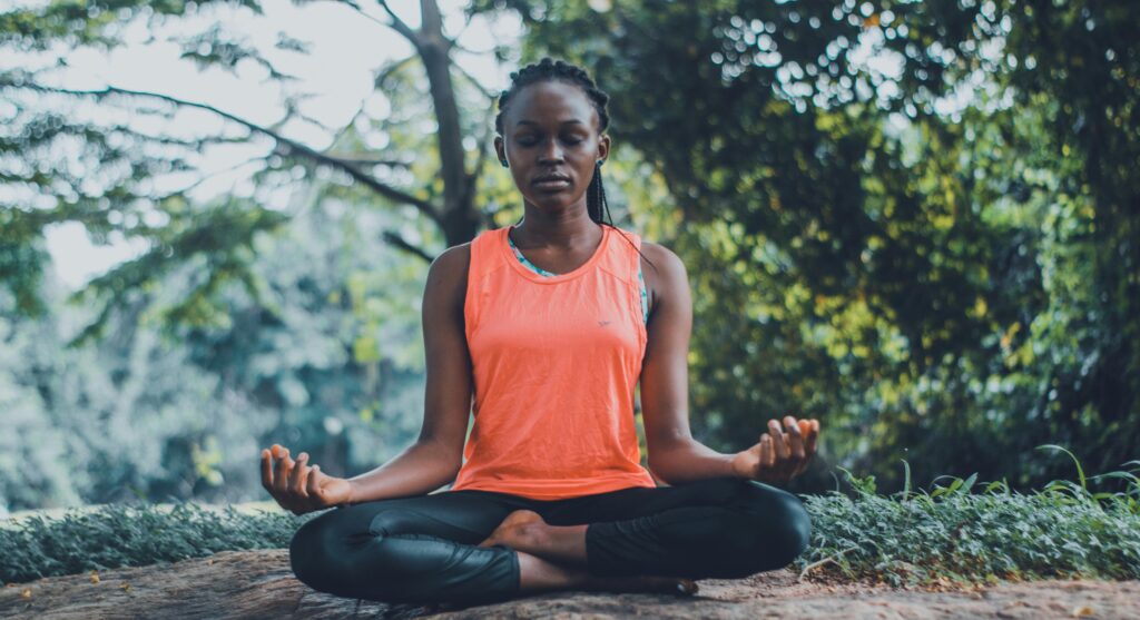 A lady meditating for personal growth