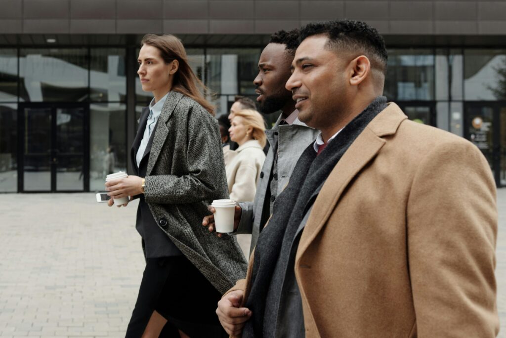 Diplomacy at work - three professionals walking together